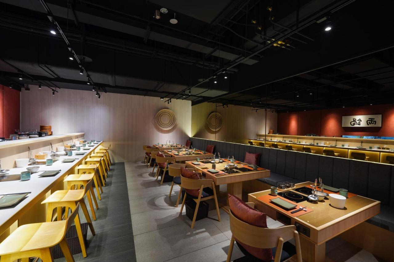 Tai Urban Resort Гаосюн Экстерьер фото Interior of a restaurant in Hong Kong