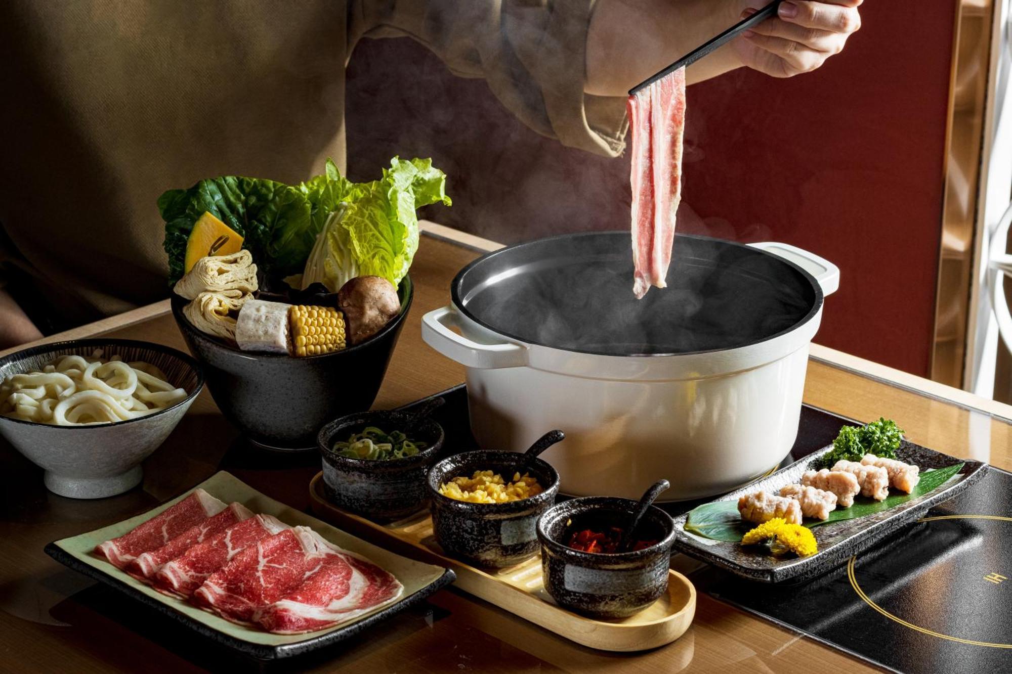 Tai Urban Resort Гаосюн Экстерьер фото A hot pot